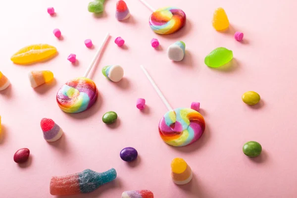 High Angle View Multi Colored Sugar Candies Lollipops Scattered Pink — Stock Photo, Image