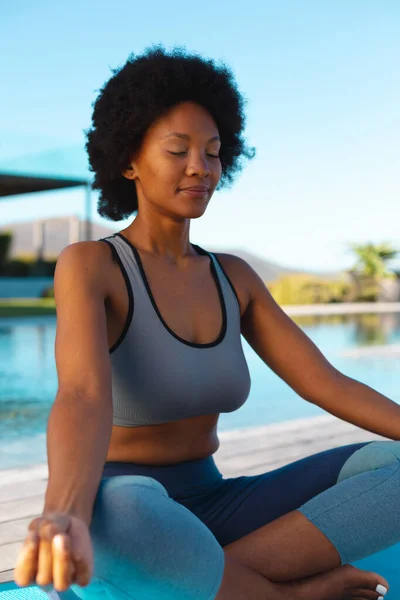 Young Afro African American Woman Meditating Poolside Copy Space Unaltered — Stock Photo, Image
