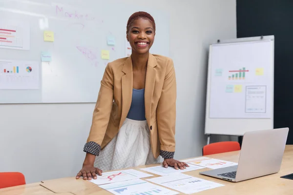 Portrait Smiling African American Young Businesswoman Charts Board Room Unaltered — Stock Photo, Image