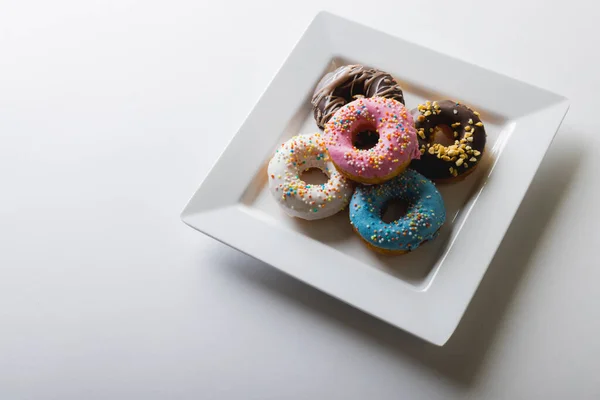 High Angle View Fresh Multi Colored Donuts Square Plate Copy — Stock Photo, Image