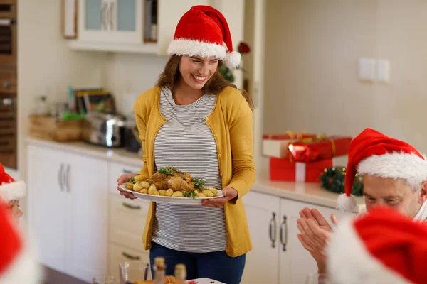 Caucasian Woman Standing Table Serving Dinner Wearing Santa Hat Quality — Stock Photo, Image