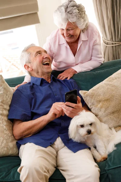 Senior Caucasian Couple Spending Time Home Together Sitting Sofa Using — Stock Photo, Image