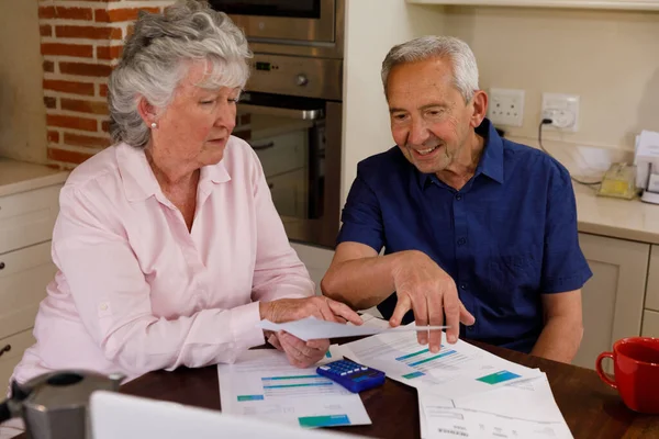 Senior Caucasian Couple Spending Time Home Together Sitting Kitchen Looking — Stock Photo, Image