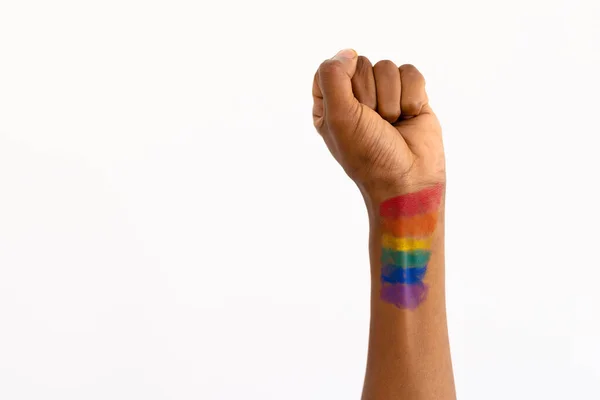 Closeup African American Man Rainbow Flag Paint Hand Clenching Fist — Stock Photo, Image