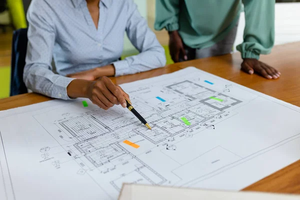 Midsection African American Female Architects Analyzing Blueprint Desk Office Copy — Stock Photo, Image