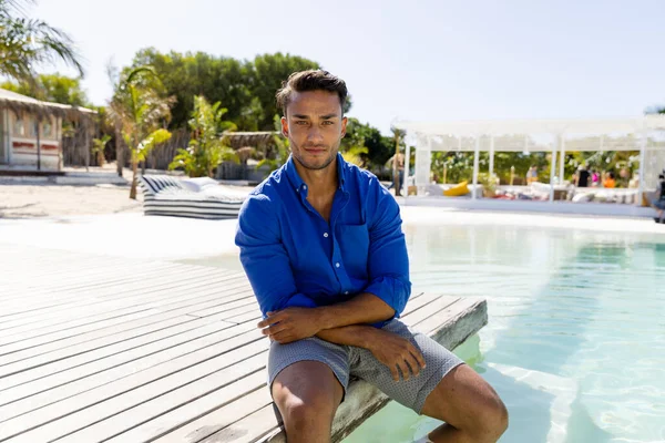 Portrait Caucasian Handsome Young Man Sitting Swimming Pool Tourist Resort — Stock Photo, Image