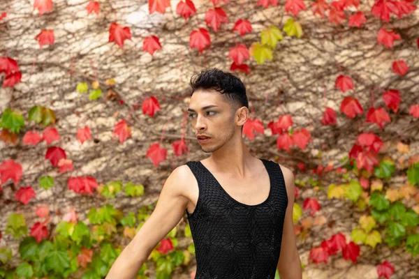 Biracial Transgender Man Looking Away Rocks Leaves Background Gender Fashion — Stock Photo, Image