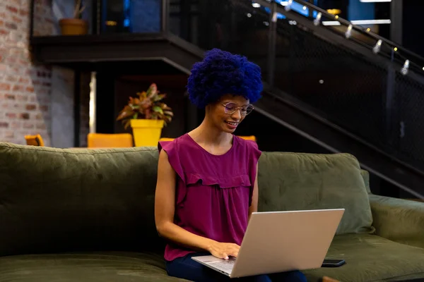 Happy Biracial Casual Businesswoman Blue Afro Using Laptop Office Lounge — Stock Photo, Image