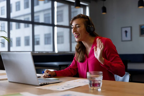 Happy Caucasian Casual Businesswoman Making Video Call Using Headphones Laptop — Stock Photo, Image