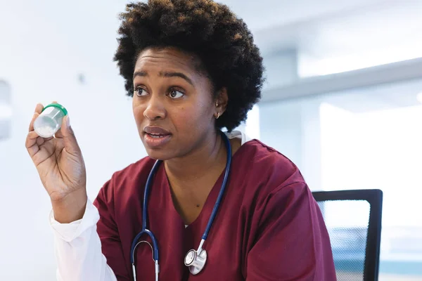 African American Female Doctor Wearing Scrubs Stethoscope Having Video Call — Stock Photo, Image