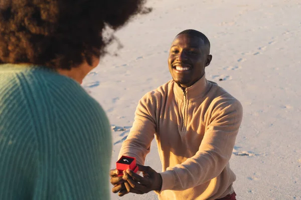 Happy African American Man Kneeling Ring Proposing Girlfriend Sunny Beach — Stock Photo, Image