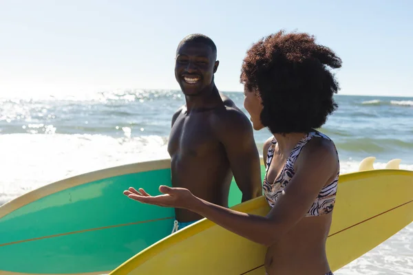 Happy Fit African American Couple Carrying Surfboards Talking Walking Sunny — Stock Photo, Image