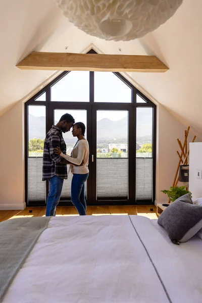 Thoughtful African American Couple Embracing Window Bedroom Lifestyle Relationship Togetherness — Stock Photo, Image