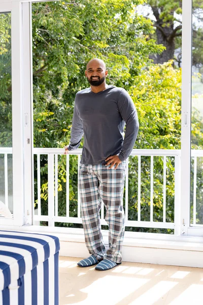 Portrait Happy Biracial Man Pyjamas Standing Sunny Balcony Home Front — Stock Photo, Image