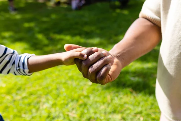 Closeup African American Father Son Holding Hands Grassy Field Yard — Stock Photo, Image