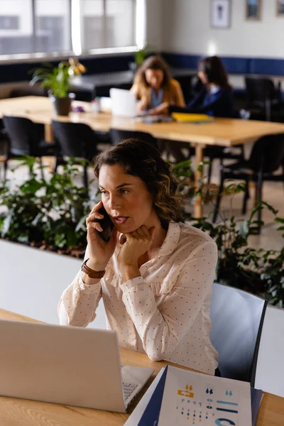 Caucasian Casual Businesswoman Using Laptop Talking Smartphone Desk Office Casual — Stock Photo, Image