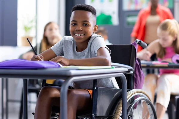 Portrait Smiling African American Schoolboy Wheelchair Working Desk Class Education — Stock Photo, Image