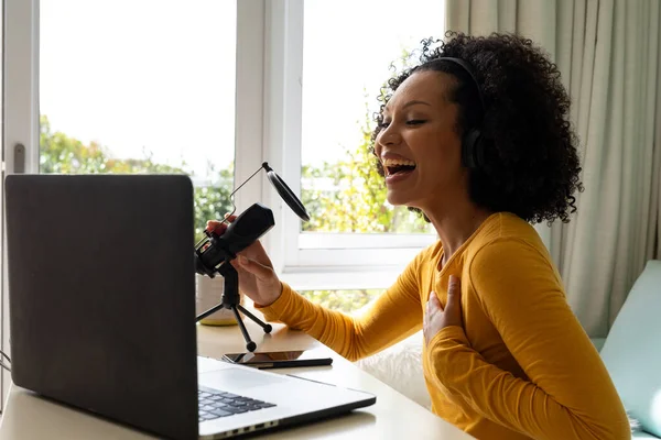 Happy Biracial Woman Using Headphones Laptop Microphone Podcasting Home Communication — Stock Photo, Image