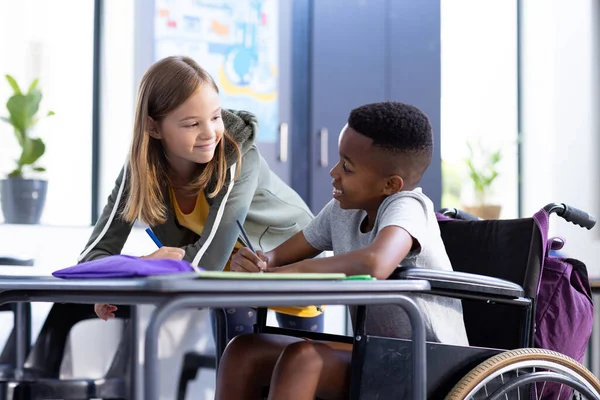 Happy Diverse Schoolgirl Schoolboy Wheelchair Working Together Desk Class Education — Stock Photo, Image