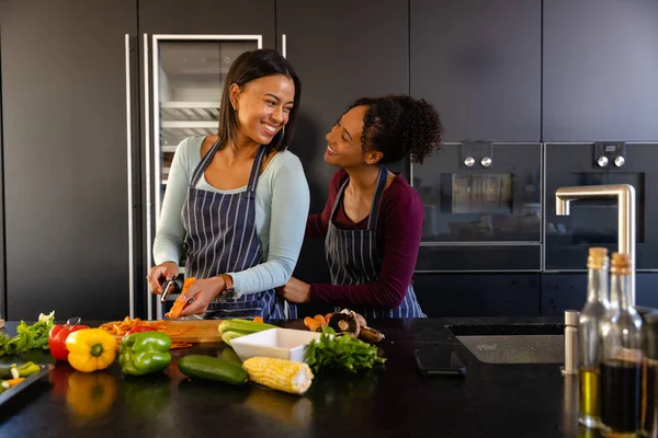 Happy Biracial Lesbian Couple Chopping Vegetables Kitchen Cooking Food Healthy — Stock Photo, Image