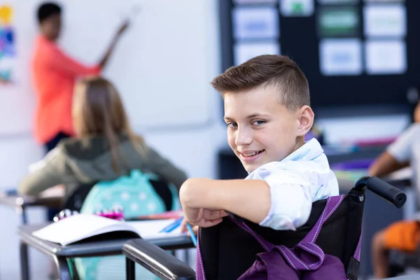 Portrait Smiling Caucasian Schoolboy Turning Desk Class Education Inclusivity Elementary — Stock Photo, Image