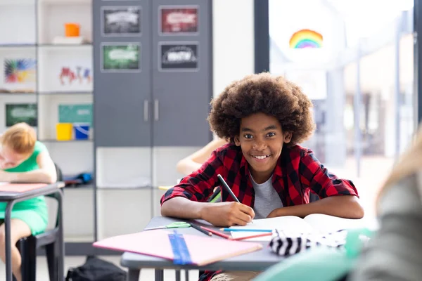 Portrait Happy African American Schoolboy Writing Desk Diverse Pupils Copy — Stock Photo, Image