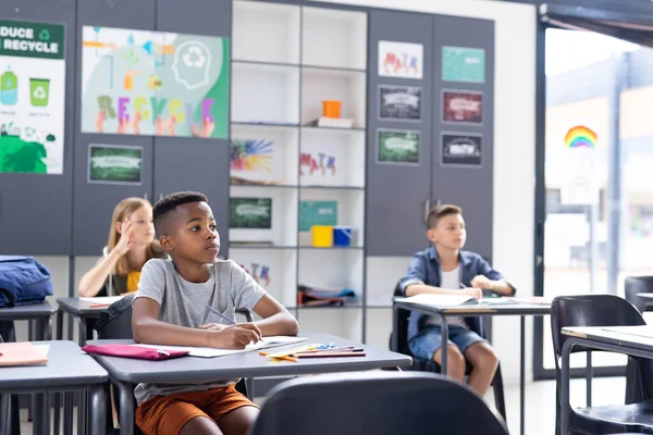 African American Schoolboy Working Desk Class Diverse Pupils Copy Space — Stock Photo, Image
