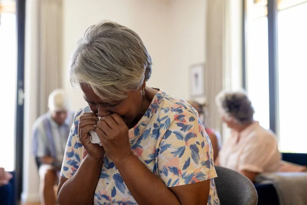 Distressed Senior Biracial Woman Holding Tissue Crying Group Therapy Session — Stock Photo, Image