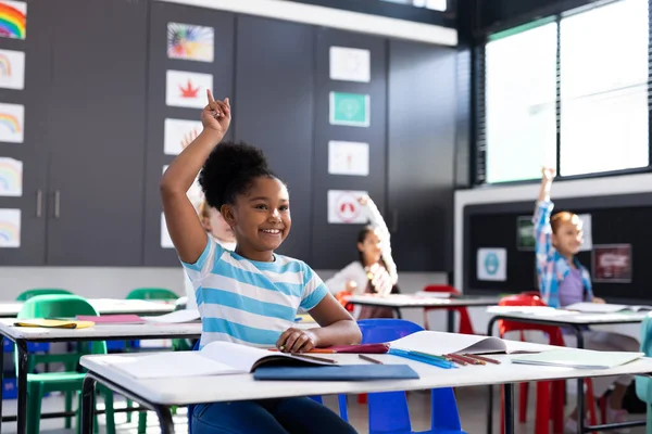 Smiling African American Girl Raising Hand Elementary School Classroom Copy — Stock Photo, Image
