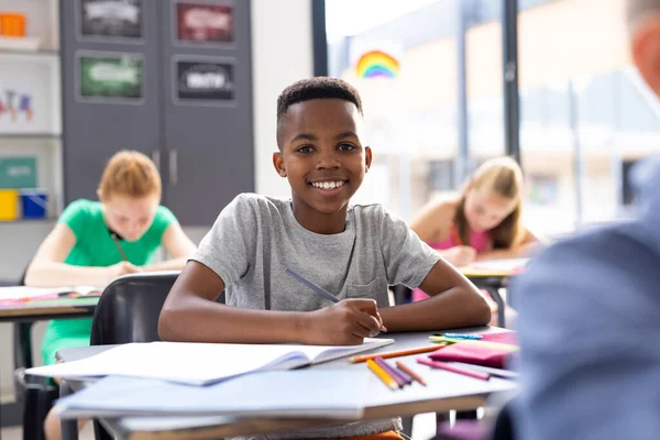 Portrait Smiling African American Schoolboy Working His Desk Class Copy — Stock Photo, Image