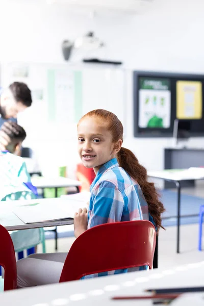 Vertical Smiling Biracial Schoolgirl Desk Elementary School Classroom Copy Space — Stock Photo, Image