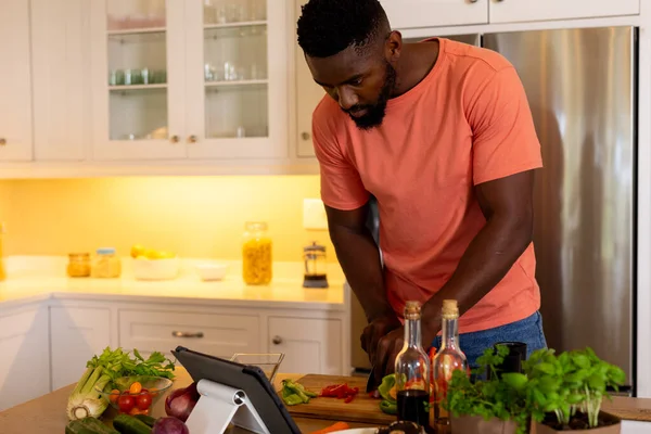 African American Man Chopping Vegetables Using Tablet Kitchen Lifestyle Food — Stock Photo, Image
