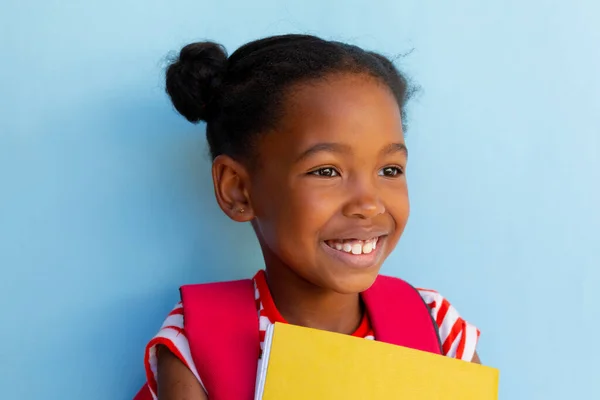 Happy African American Schoolgirl Holding Books Blue Background Elementary School Stock Image