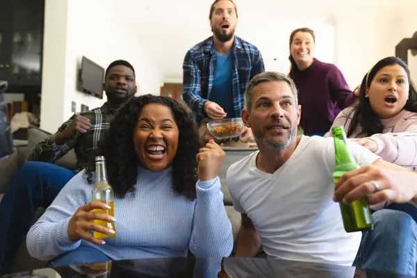 Excited Diverse Male Female Friends Watching Sport Home Drinking Beers — Stock Photo, Image