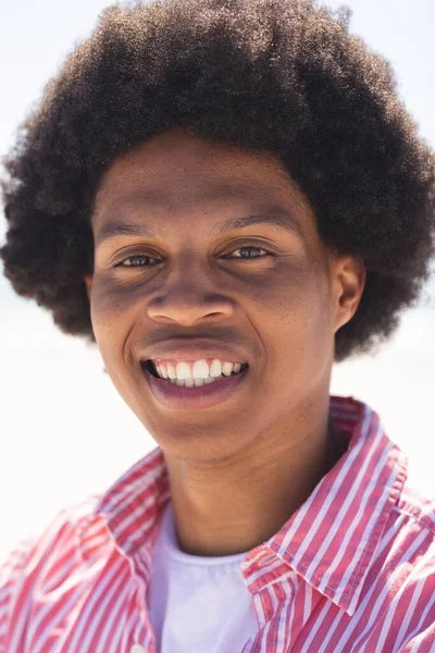 Young African American Man Smiles Brightly Beach His Cheerful Expression — Stock Photo, Image