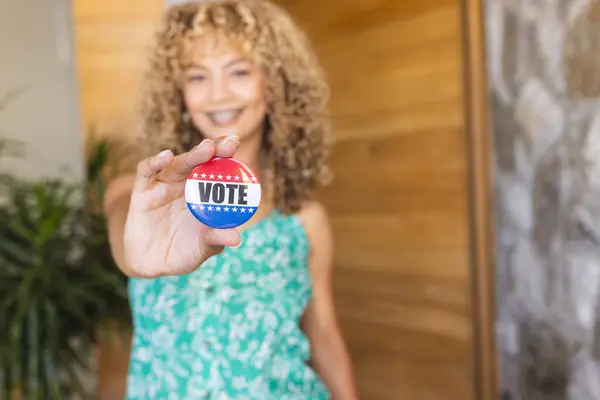 Young Biracial Woman Holds Vote Badge Camera Copy Space Her — Stock Photo, Image