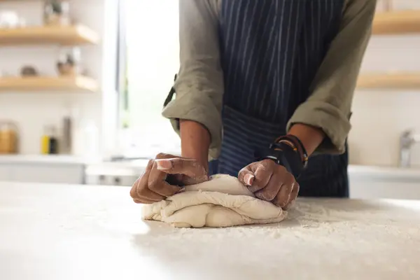 Young African American Woman Kneads Dough Kitchen Counter Her Focus — Stock Photo, Image