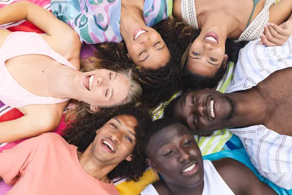 Diverse Group Young Adults Lying Circle Smiling Upwards Enjoying Moment Royalty Free Stock Photos