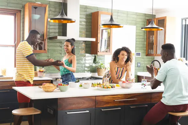 Diverse Group Enjoys Lively Moment Modern Kitchen Two Men Two — Stock Photo, Image