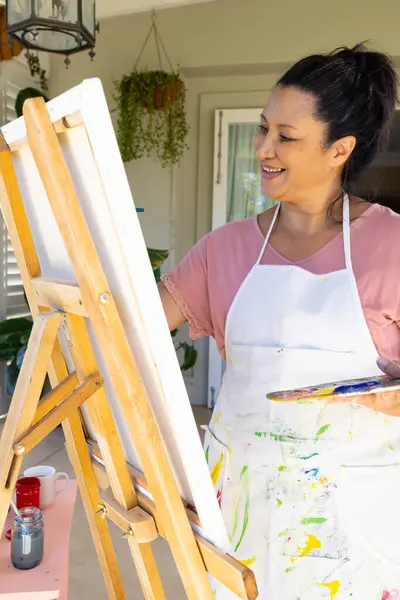 Mature Biracial Woman Painting Easel Outdoors Home She Has Dark — Stock Photo, Image