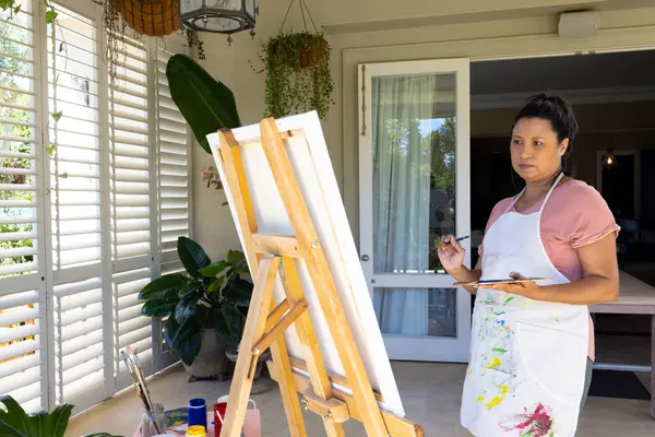 Mature Biracial Woman Painting Canvas Home She Has Dark Hair — Stock Photo, Image