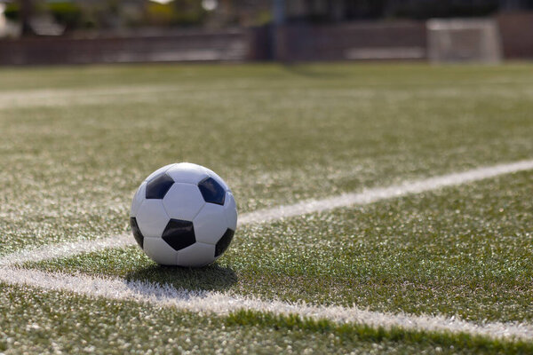 Soccer Ball Resting Green Artificial Turf White Line Field Outdoors Royalty Free Stock Photos