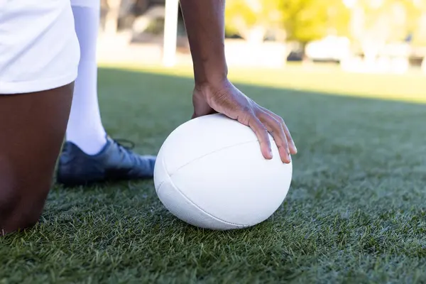 African American Young Male Athlete Holding White Rugby Ball Field Stock Image