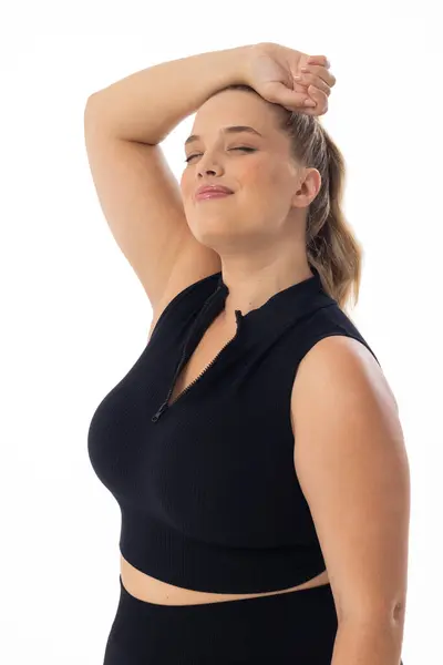 Velikost Běloška Ženský Model Natahuje Ruku Hlavu Bílém Pozadí Nosí Royalty Free Stock Fotografie