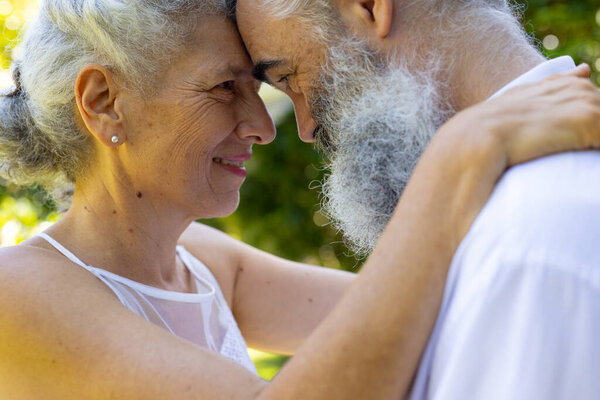 Embracing and smiling, senior bride and groom at wedding outdoors in park. love, affection, happiness, embrace, smile, tenderness — Stock Image Embracing Smiling Senior Bride Groom Wedding Outdoors Park Love Affection Stock Picture