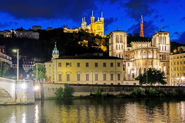 stock image Beautiful view of Cathedral Saint-Jean-Baptiste, Notre-Dame de Fourviere Basilica and Saone river at dusk, Lyon, France