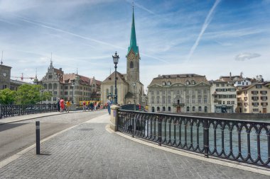 Fraumunster Church and river Limmat on a sunny day, Zurich, Switzerland clipart