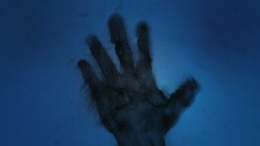 Bir el gölgesi animasyonu kavramı, parçacıklardan inşa edilmiş şeytani arka plan.