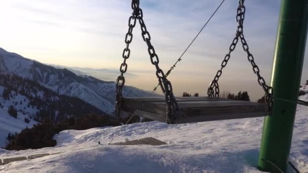 Swing Winter Mountains Sunset View Sun Goes Snowy Mountains Coniferous — Stock Video
