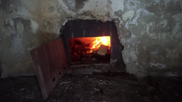 Fire Burning Old Stove Wall Rusty Metal Door Damp Frozen — Stockvideo